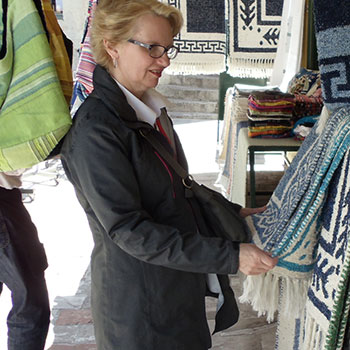 Sharon inspecting quilts